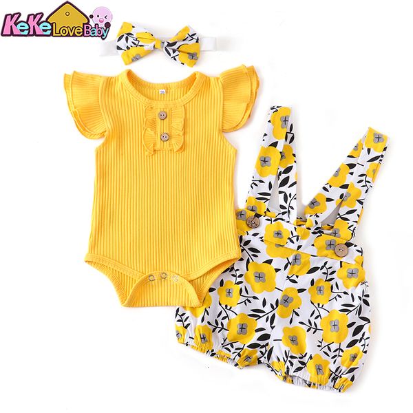 Completi di abbigliamento Set di vestiti estivi per neonata Set di moda infantile per maglieria in cotone con volant Pagliaccetto Pantaloncini con fiocco Fascia per capelli 3 pezzi per abiti per bambini 230517