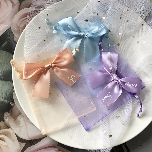 Kutular 100pcs organza çantası ins rüzgar gazlı çanta takı ambalaj çantası doğum günü hediye çantası yaratıcı yay şeker çantası çizmek toptan satış