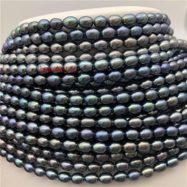 Perlen Großhandel 2PCS Neue Mode Einfache Natürliche reis form 67mm AAA schwarze perle lose perlen DIY 15