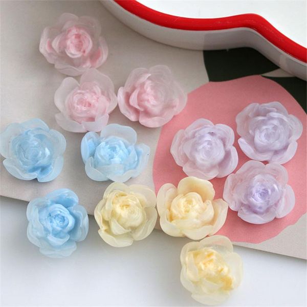 Crystal Wholesale 100pcs/lotto da 18 mm Stampa a colori cartone animato Camellia Forma Fiori di resina perle orecchini per gioielli fai -da -te/accessorio per capelli