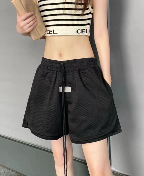 2023 New Man Sports Casual Pantaloncini da basket Donna Solid Loose Double Layer Mesh traspirante Pantaloni corti High Street