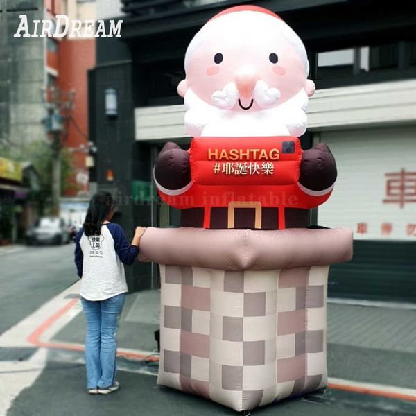 Hot Salling All'aperto Gigante Gonfiabile Santa Modello Aria Soffiata Padre Che Striscia Fuori Dal Camino Per La Decorazione Di Natale