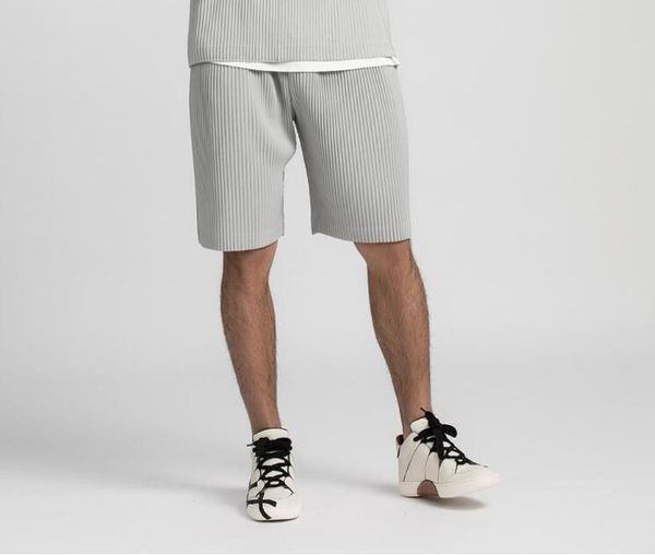 De alta qualidade masculina casual planta plissado largo shorts de perna larga masculina de tubo reto que sente curta