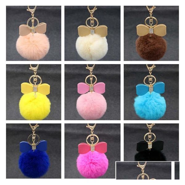 Portachiavi di alta qualità Rex Rabbit Fur Ball Portachiavi Diamante Bowknot Ornamenti per auto da donna Regalo R280 Ordine della miscela 20 pezzi Un sacco Drop De Dhzwu