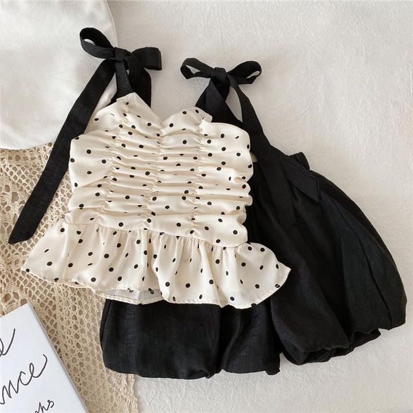 Completi di abbigliamento Abiti estivi per bambini in stile coreano Abiti Ragazze alla moda Top con cinturino per spaghetti e pantaloni corti neri Dolce carino 2 pezzi Set