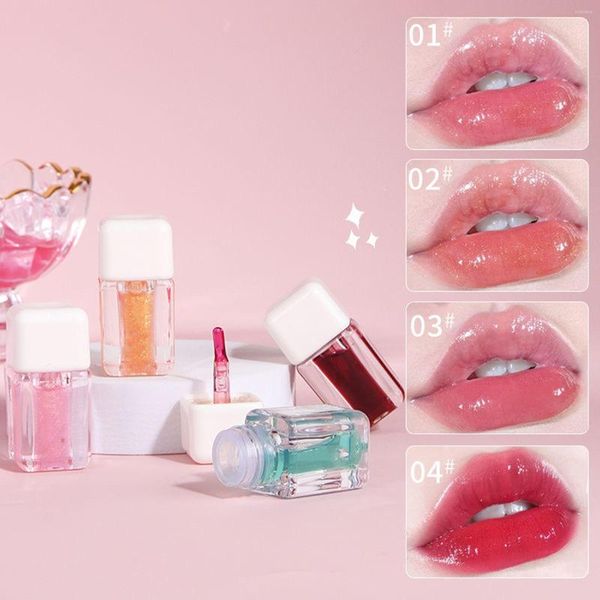 Lipgloss, kleiner Würfel, wasserhelles Glas, laminiert, perlmuttartig, mit schimmernden, klaren, kristallklaren, hellen Farbflecken