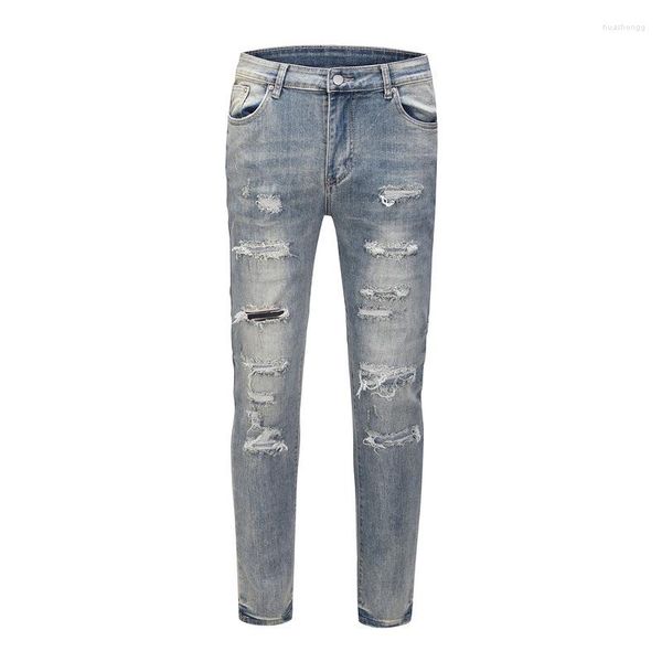 Jeans da uomo La tendenza di High Street è quella di far lavare i vecchi vestiti Fori di rottura dell'acqua Baffi di gatto Danni Slim Blue