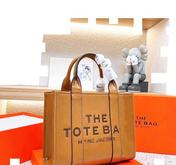 Designer -Einkaufstasche für Frauen Präge Brief Handtasche Luxusumbilder große Kapazität 34 cm braune Lederhandtaschen Frauen Leinwand Topbags Motion Design 52ES