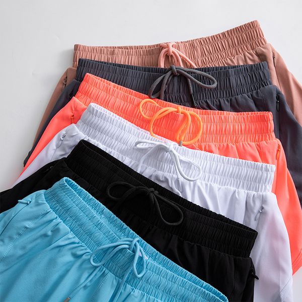 2024 Lu Lemens Şort Sıcak Yüksek Rise Pantolon Nefes Alabilir Quickdry Yoga Şortları Dropin Cepler Kargo Pantolon Tasarımcı Pantolon Kadın Sürekli Drawcord Baharatlı Pan