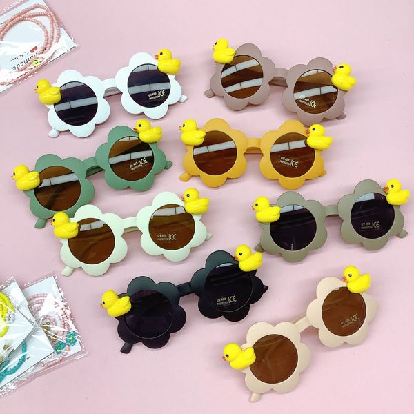 Детские солнцезащитные очки девочки цветы солнечные очки резиновая утка ретро -модельер бокалы мальчик солнцезащитный крем оптовой пляжный приморский приморский мод