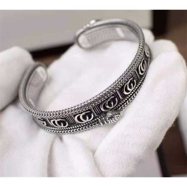 20% скидка 2023 Новый дизайнерский ювелирное украшение кольцо полоса кольцо трехмерная король змея открытая шестерна Модный мужской браслет