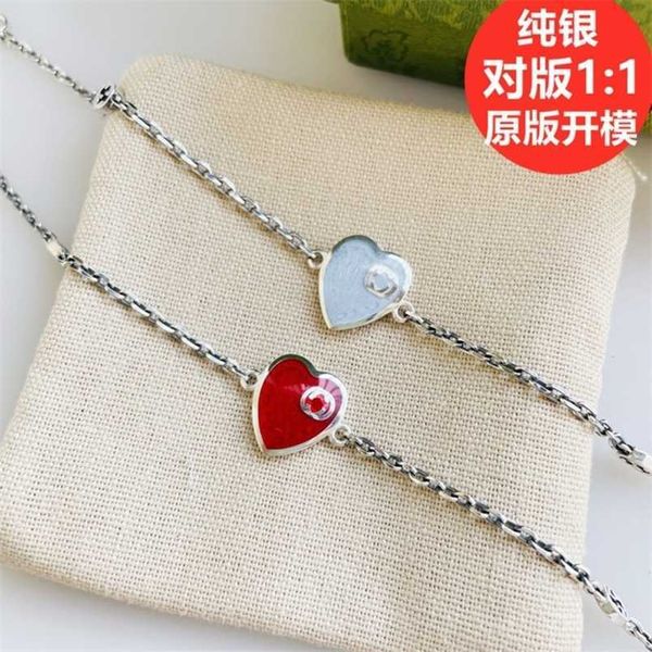 20% di sconto 2023 Nuovo braccialetto di gioielli di design collana anello colla smaltata che cade Cuore rosso 925 usato cuore blu intrecciato da donna coppia d'amore Bracciale