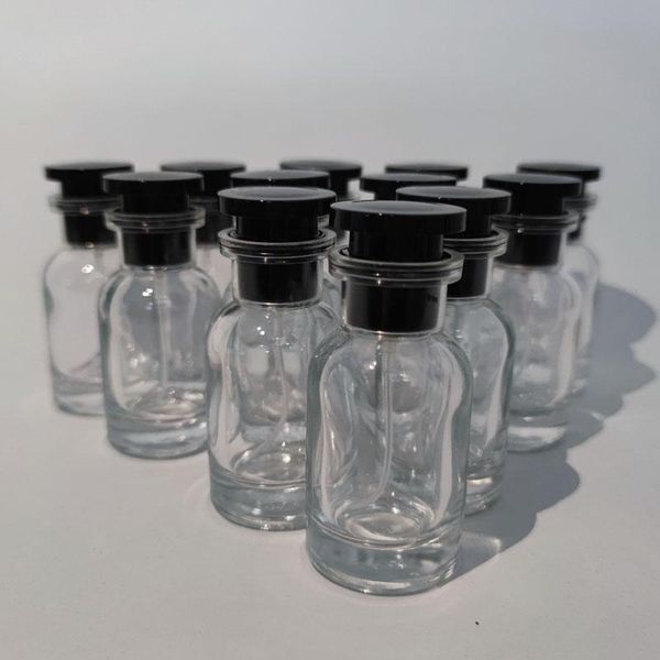 Bottiglia da 12 pezzi da 30 ml all'ingrosso Travel PortEvent Defume Bottiglia di profumo con scatole Spray vuoto Strumenti di imbarcazione a bottiglia campione separata
