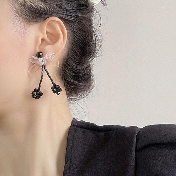 Orecchini pendenti U-Magical Ins Style Orecchino Bowknot nero per le donne Fata Gioielli in nappa di cristallo con perline acriliche trasparenti