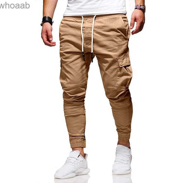 Pantaloni da uomo 2023 Autunno / Inverno Pantaloni da uomo Multi tasche Pantaloni slim-fit Cravatta elastica Pantaloni cargo sportivi Pantaloni da jogging casual YQ231201