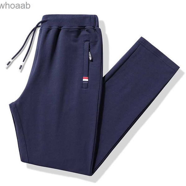 Pantaloni da uomo Pantaloni autunnali Uomo Fitness Abbigliamento sportivo Tuta Elastico in vita Pantaloni sportivi Pantaloni di cotone Palestre larghe Pantaloni da jogging Pantaloni da uomo M- 8XL YQ231201