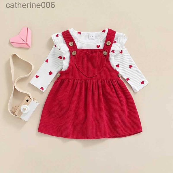 Set di abbigliamento San Valentino Neonato Abito in due pezzi per bambina Modello a cuore Volant Manica lunga O-Collo Pagliaccetto + Gonna di velluto a coste con bretelleL231202