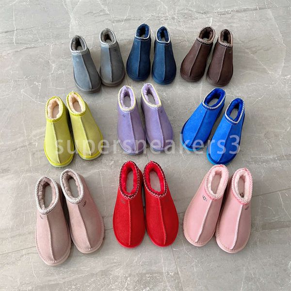 2023 Zapatillas de diseñador Botas de nieve para bebés Australia Mini botines Plataforma Niñas Mujeres Bota Zapatos mullidos de invierno para niños Tamaño de lana de gamuza 21-35