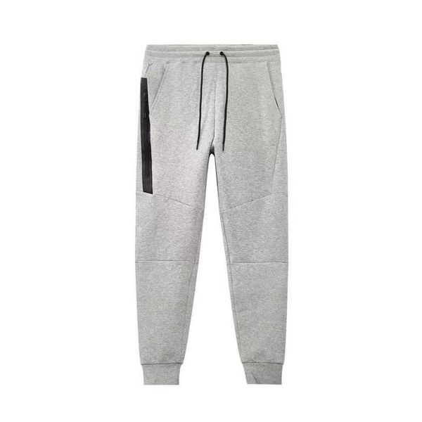 Calças masculinas Mens Calças Casuais Corredores Marca Elástica Mulheres Sportswear Tracksuit Bottoms Preto Cinza Corredores Calças de Pista Skinny Sweatpants