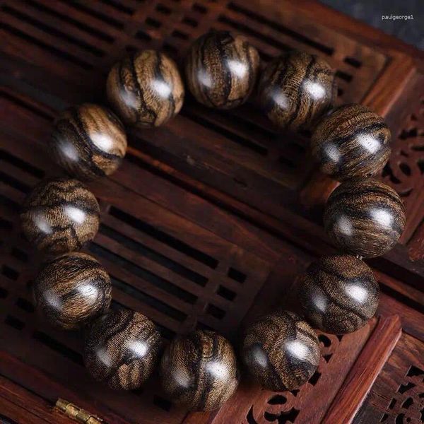 Filo autentico naturale Vietnam Nha Trang Bracciale in legno di agar Modello di pelle di tigre Spot Artigianato Preghiera buddista