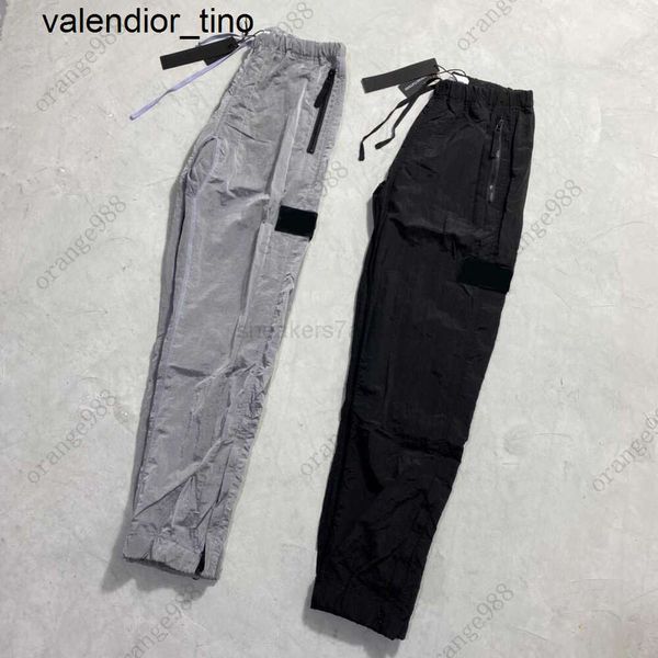 Calças de carga dos homens marca designer pedra moda marca cores ilha primavera náilon reflexivo joggers carga streetwear calças das mulheres dos homens