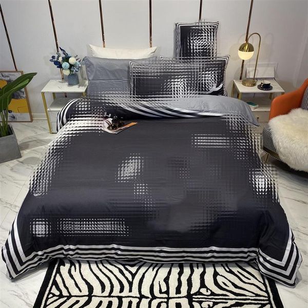 Set di biancheria da letto king size dello stilista 4 pezzi copripiumino matrimoniale in seta stampata floreale lenzuolo nero rosa federe di alta qualità254l