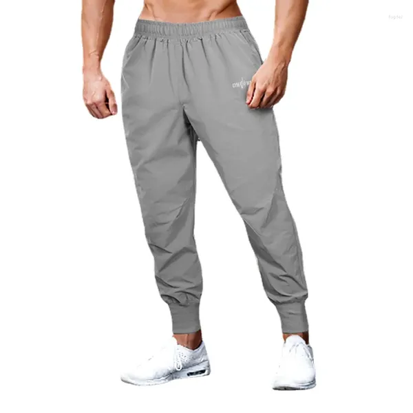 Pantaloni da uomo Pantaloni da jogging Uomo Palestra Sport Fitness Corsa Basket Allenamento ad asciugatura rapida Bodybuilding Pantaloni con bocca a fascio