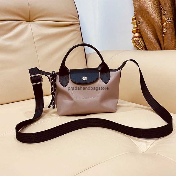 Akşam yemeği çantası fransız yeni ürün Hualong xiangniu deri crossbody hamur çantası kadın moda tek omuz elle