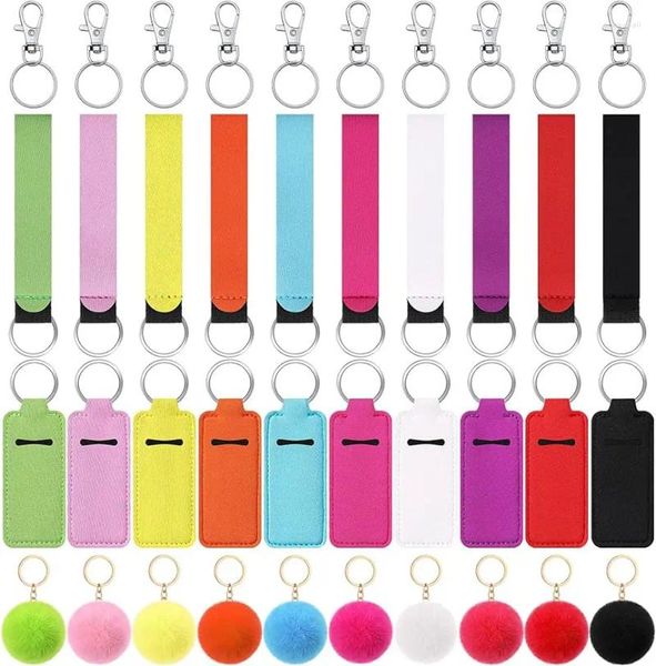 Keychains 40pcs Lippenstifthalter Keychain Lippenclip auf dem Beutel Flauschigen Ball mit Schlüsselring