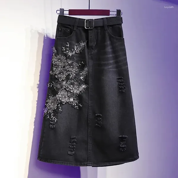 Röcke Europäischer mittellanger Jeansrock für Damen, halb weiblich, Übergröße, bestickte Blume, lässig, A-Linie