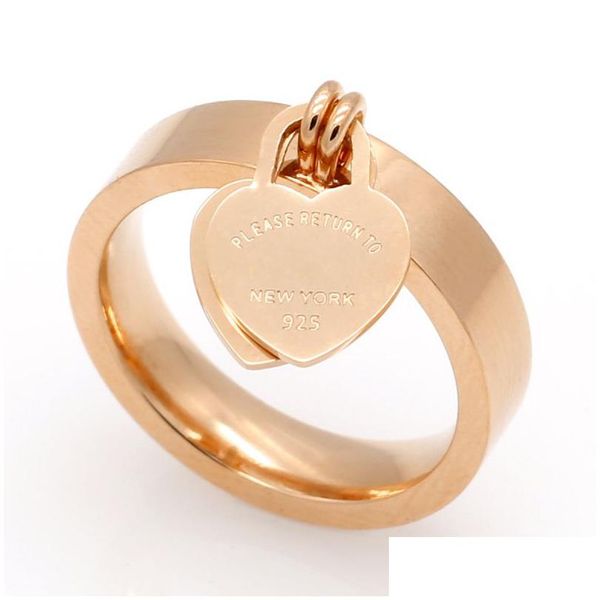 Anelli a fascia Anello d'amore Gioielli 316L Titanio placcato oro a forma di cuore Moda T Lettera Doppio cuore Anelli di promessa femminile per uomo Donna G Dhfeg