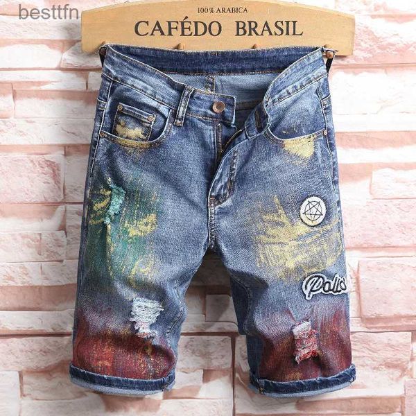 Jeans da uomo Personalità Uomo Graffiti Pantaloncini di jeans Estate Nuova etichetta di moda Strappato Foro Jeans dritti dipinti Pantaloncini StreetwearL231208