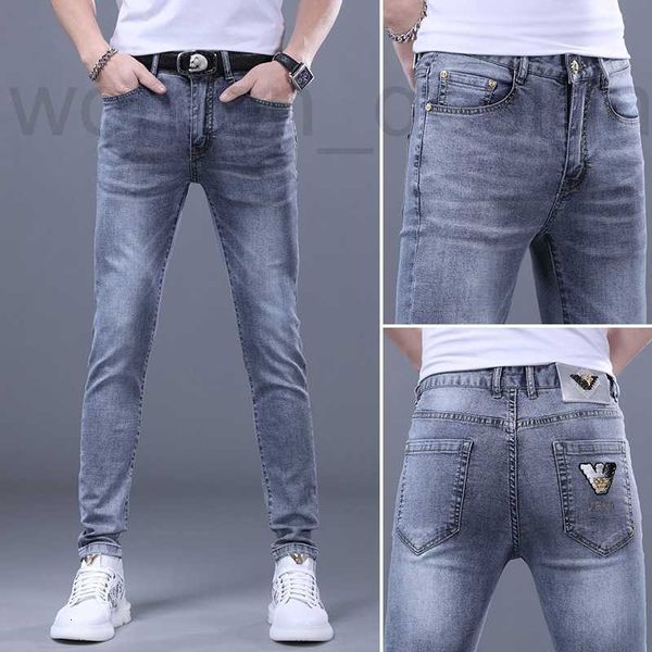 Jeans masculinos designer de luxo novas calças jeans edição coreana casual elástico fino ajuste pequeno pé bordado quente diamante azul para homens f0q8
