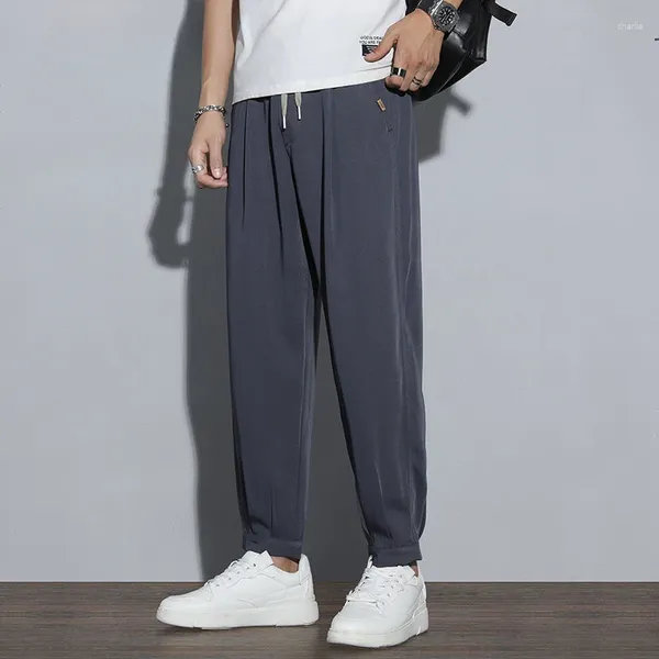 Pantaloni da uomo Primavera Estate Stile coreano Tinta unita Moda Uomo Harajuku Pantaloni larghi casual Tasca Oversize Abbigliamento streetwear maschile