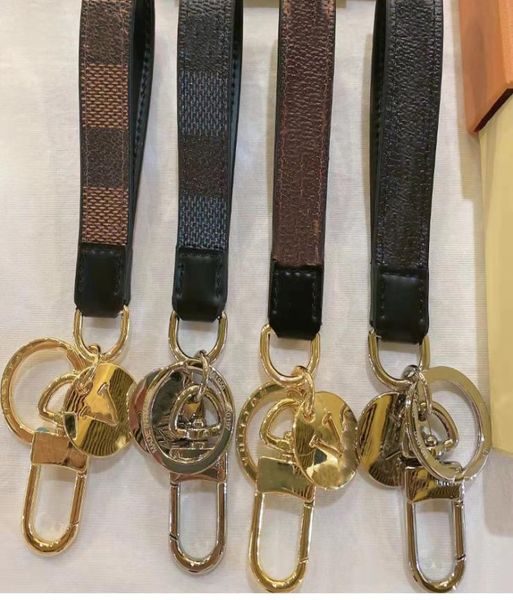 Классический коричневый цветочный кошелек для ключей, высококачественные кожаные брелки из нержавеющей стали, дизайнерские сумки, подвесные аксессуары6057011