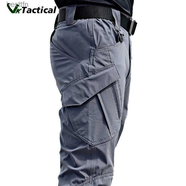 Calças masculinas Novas calças táticas de calças táticas Elasticidade do bolso Militar Urbano Comter Tacitcal Homem Men Slim Fat Cargo Pant 5xll231212