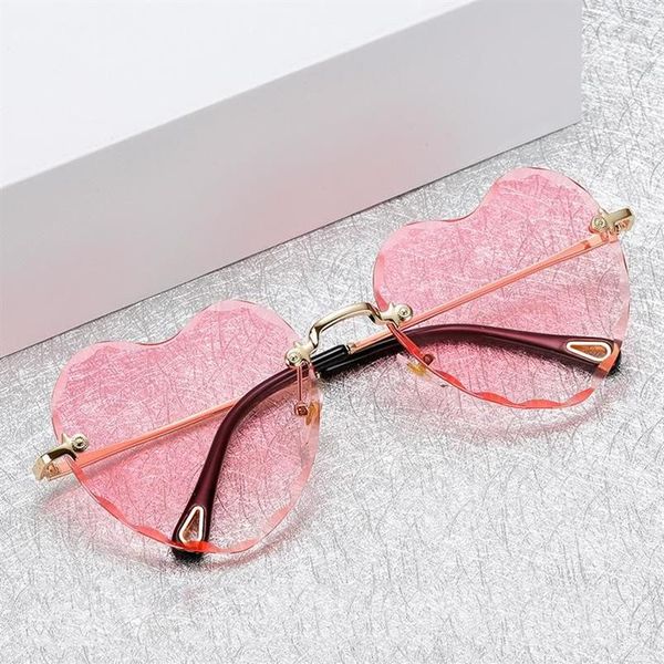 Occhiali da sole 2022 Brand Design a forma di cuore senza cornice per le donne Moda Vintage Trend Ladies Metal Gradient UV400 Love Sun Glasses3147