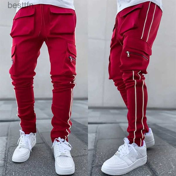 Pantaloni da uomo Pantaloni cargo da uomo di marca di moda primavera e autunno nuovi pantaloni fitness sportivi e per il tempo libero pantaloni da allenamento jogger riflettenti notturniL231212