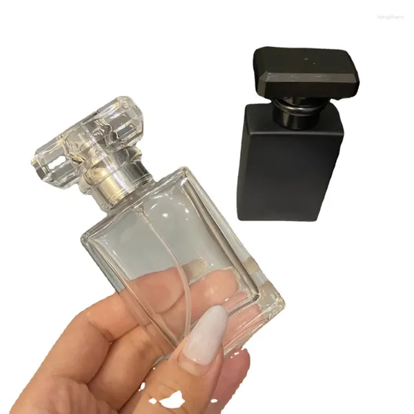 Frascos de armazenamento 1 pcs frasco de perfume engarrafamento 30ml viagem portátil pressionado spray preto vidro transparente vazio