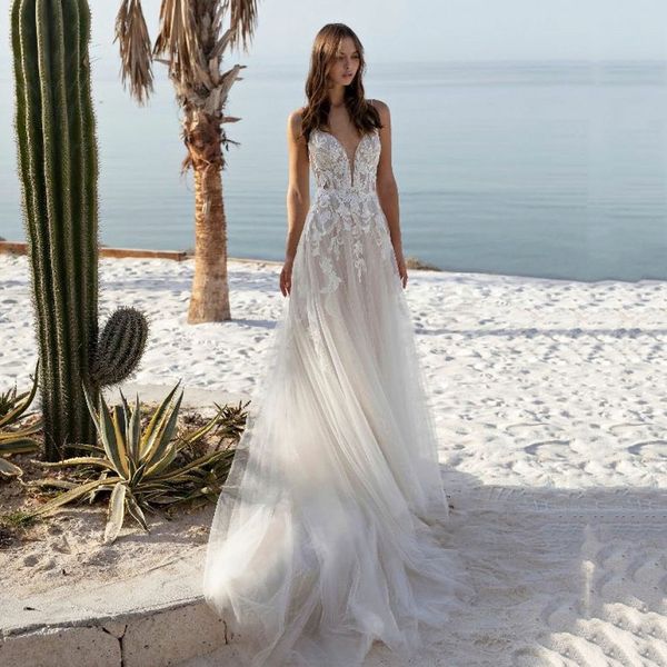 Abiti da sposa classici senza schienale con strascico per le donne Applique senza maniche Tulle a trapezio con scollo a V profondo alla moda