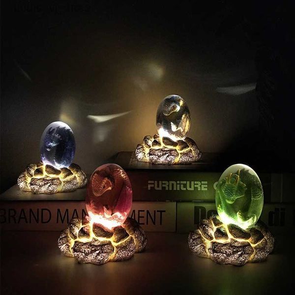 Luci notturne LED Luminoso Lava Dragon Egg Luce notturna Camera da letto Comodino Decorazione scrivania Uovo di dinosauro Souvenir Lampada da tavolo regalo YQ231214