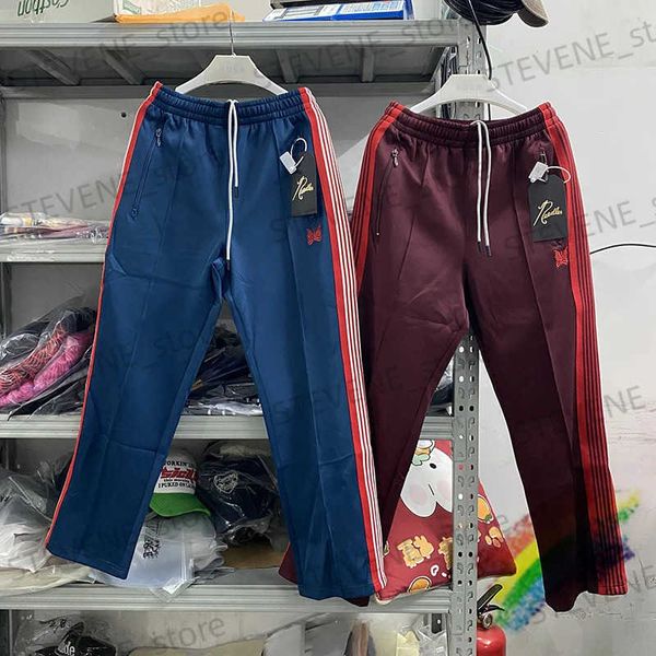 Pantaloni da uomo Aghi Pantaloni Uomo Donna Poly Smooth Needles Pantaloni da pista Pantaloni lavorati a maglia a righe Farfalla Pantaloni AWGE stretti T231214