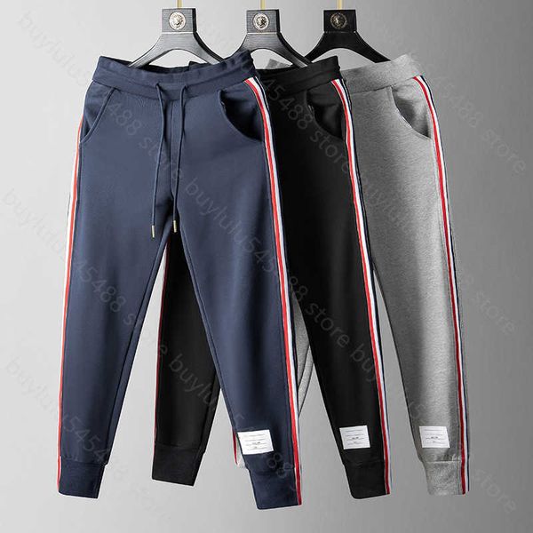 Pantaloni da uomo e da donna Pantaloni di marca di moda Thombrownsweatpant Tb Trendy Primavera Autunno Nastro a righe in puro cotone Sport Tempo libero Leggings alla moda Trendy Mpre