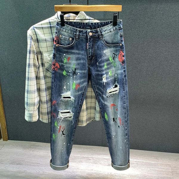 Jeans masculinos magro 2023 primavera graffiti rasgado buraco spray pintura remendo hiphop moda denim calças masculino streetwear 231214