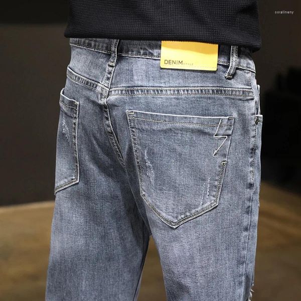 Jeans masculinos rasgados primavera e verão elástico auto-cultivo marca na moda versão coreana calças lápis magros