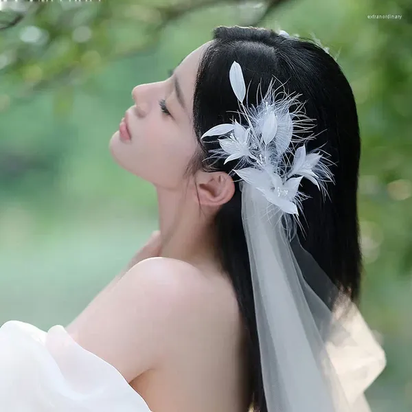 Tendenza moda del copricapo della sposa stile fata fermagli per capelli con piume Mori Genie Temperamento Cento gioielli fatti a mano
