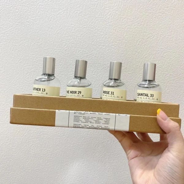 Pacote de marcas de alta qualidade Perfume unissex Mulheres Homens Sabor Natural Sabor Madeira Feminino Parfum Fragrâncias 4X30Ml (13-29-31-33)