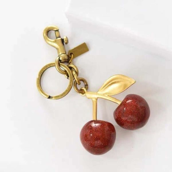 Portachiavi in cristallo stile ciliegia rosso borsa da donna ciondolo per auto accessori moda frutta fragola mela borsa decorazione123