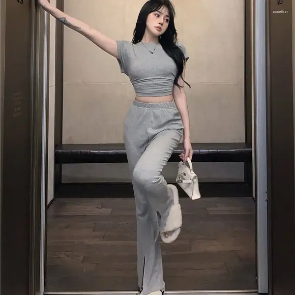 Zweiteilige Hosen für Frauen 2023 Sommer 2 Sets Frauen Design aushöhlen sexy abgeschnittenes T-Shirt Einfarbig Empire Wide-Leg Teens Koreanische Mode W31