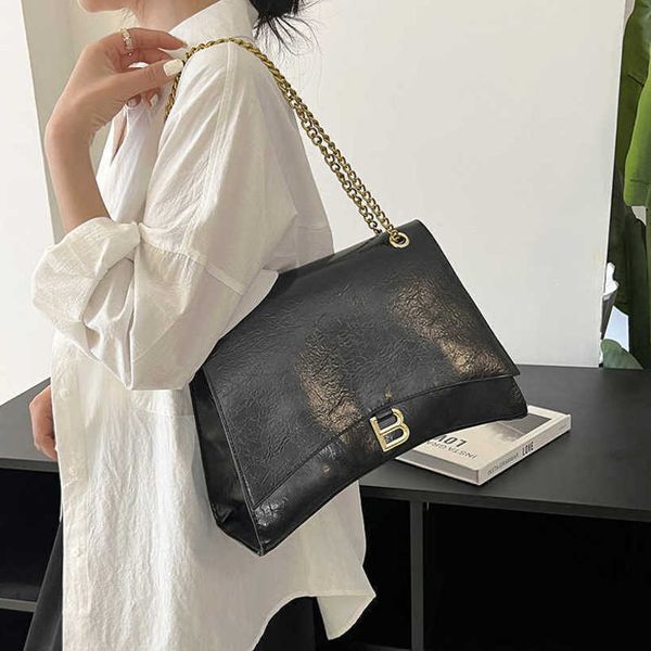 Designer bolsa feminina ampulheta óleo cera couro preto corrente de ouro um ombro crossbody versátil estilo ocidental saco andarilho